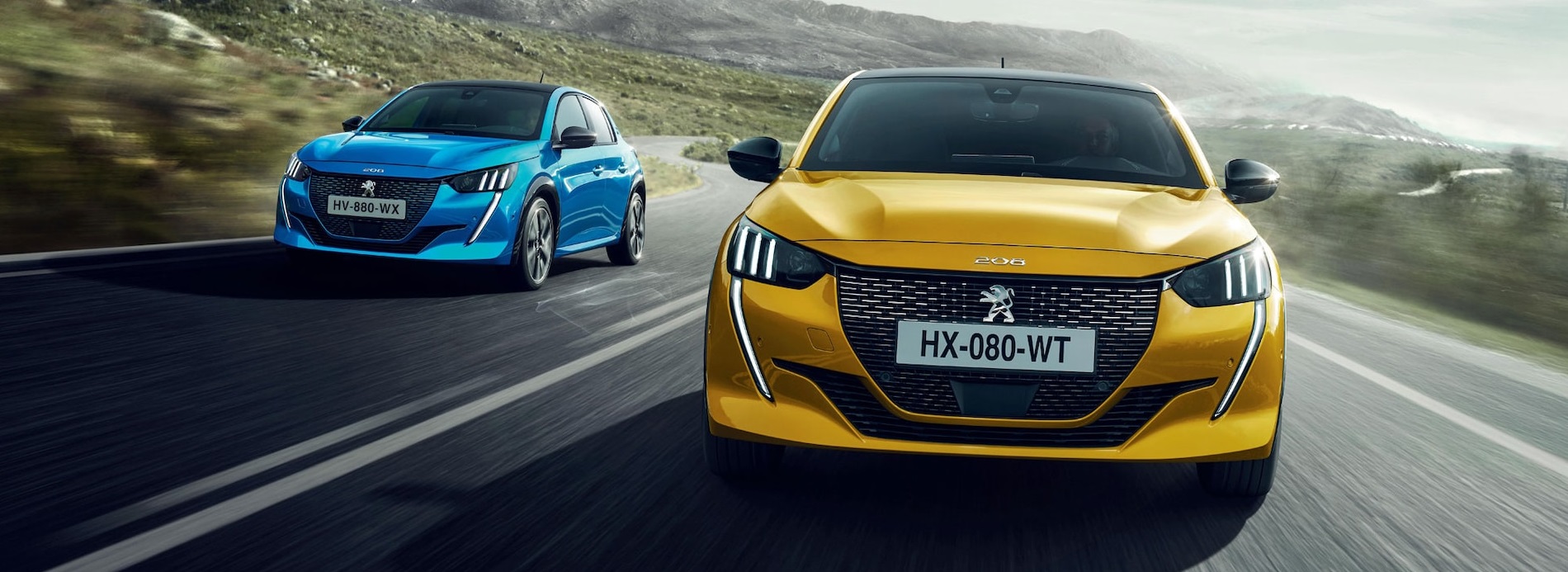Blue and Yellow Peugeot 208 forward facing