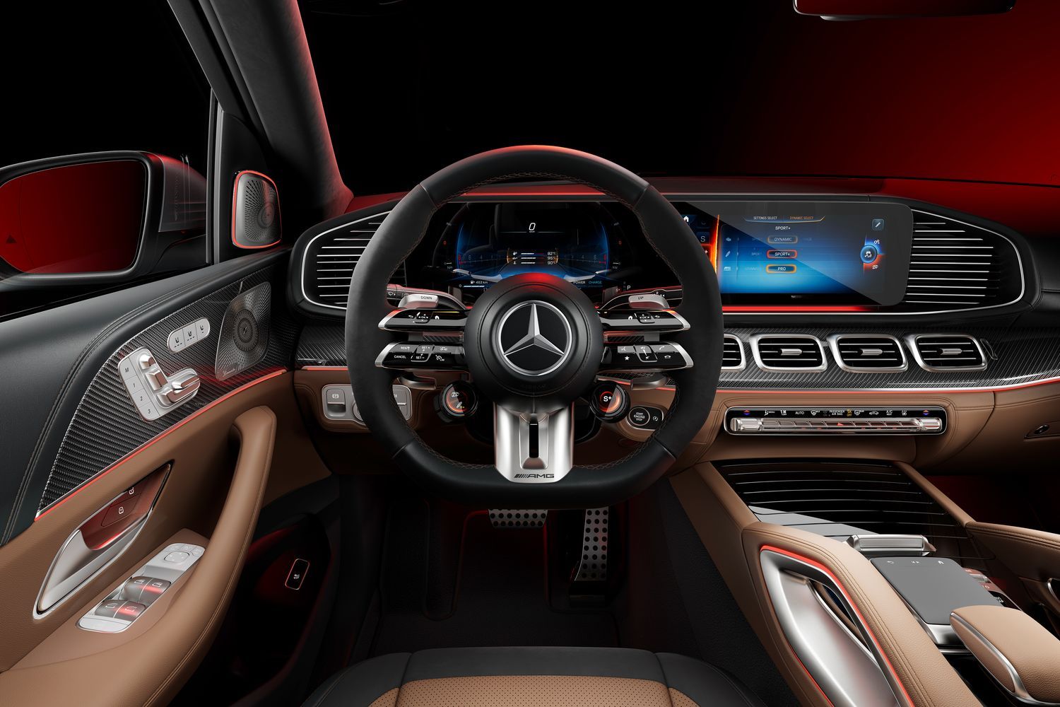 Mercedes-Benz GLS's black and tan interior featuring a black steering wheel and two infotainment displays.