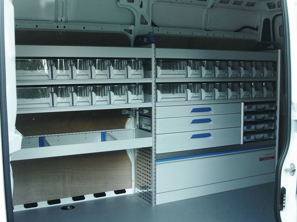 Van racking system with organised storage bins, shelving and pull-out drawers.