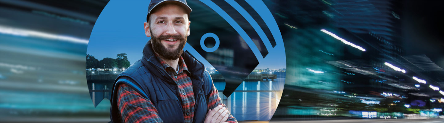 Man with navy hat smiling