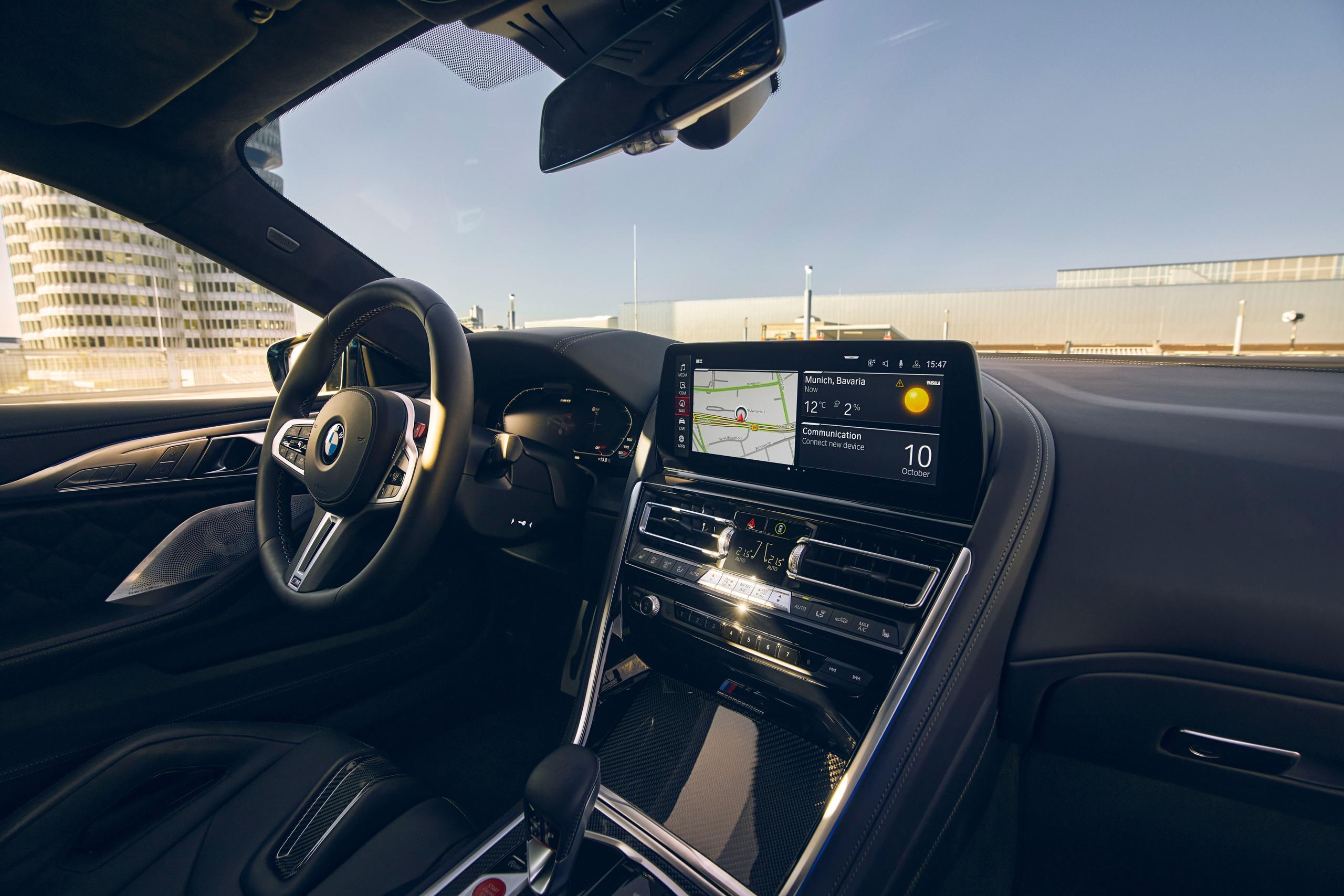 New BMW M8 Competition passenger view of infotainment system