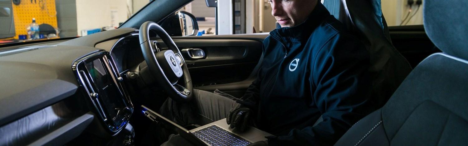 Agnew Belfast Volvo Mechanic inspects used volvo during MOT preparation