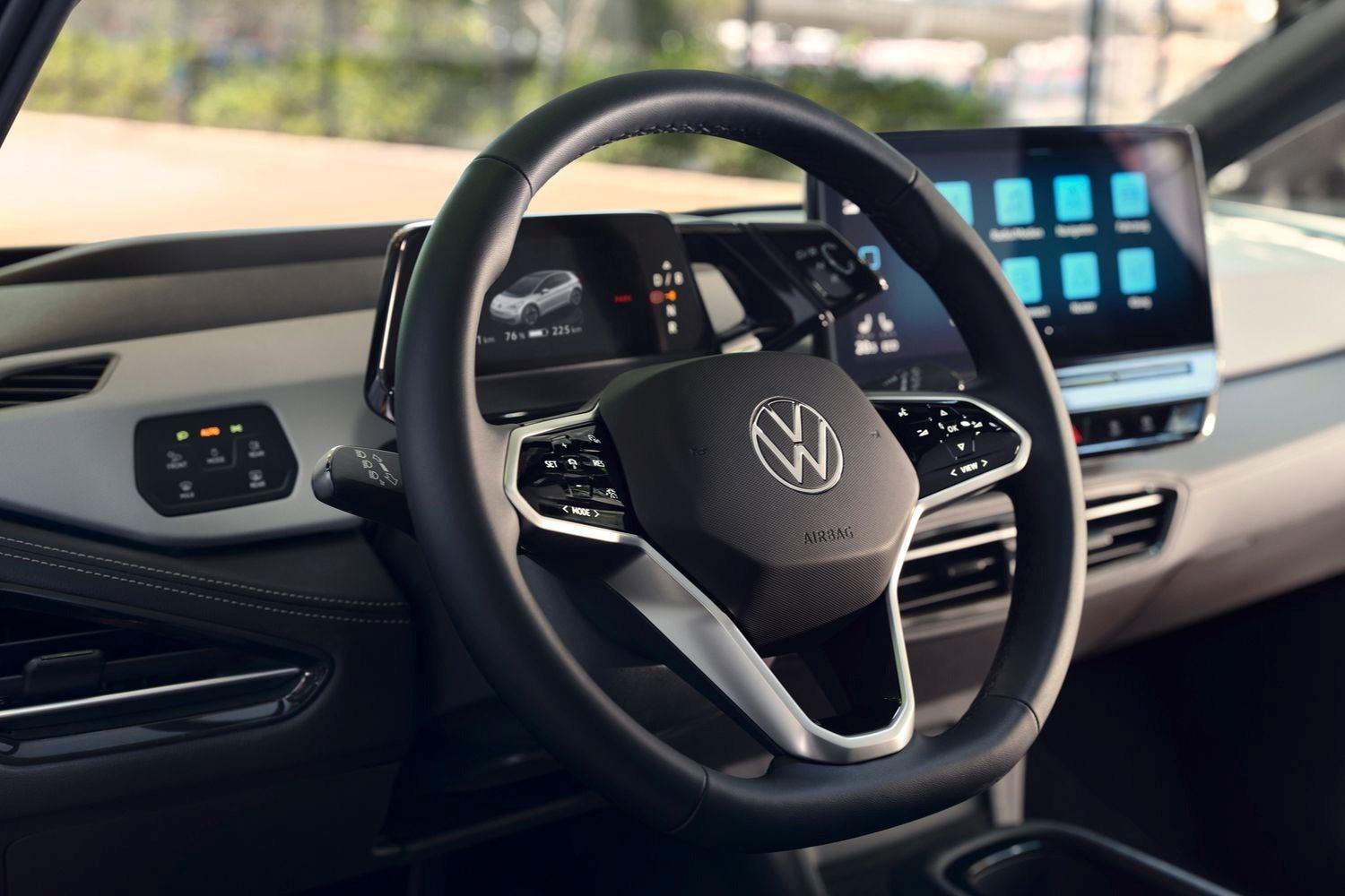 Interior view of the new Volkswagen ID.3, close-up of the steering wheel and infotainment system from the driver side