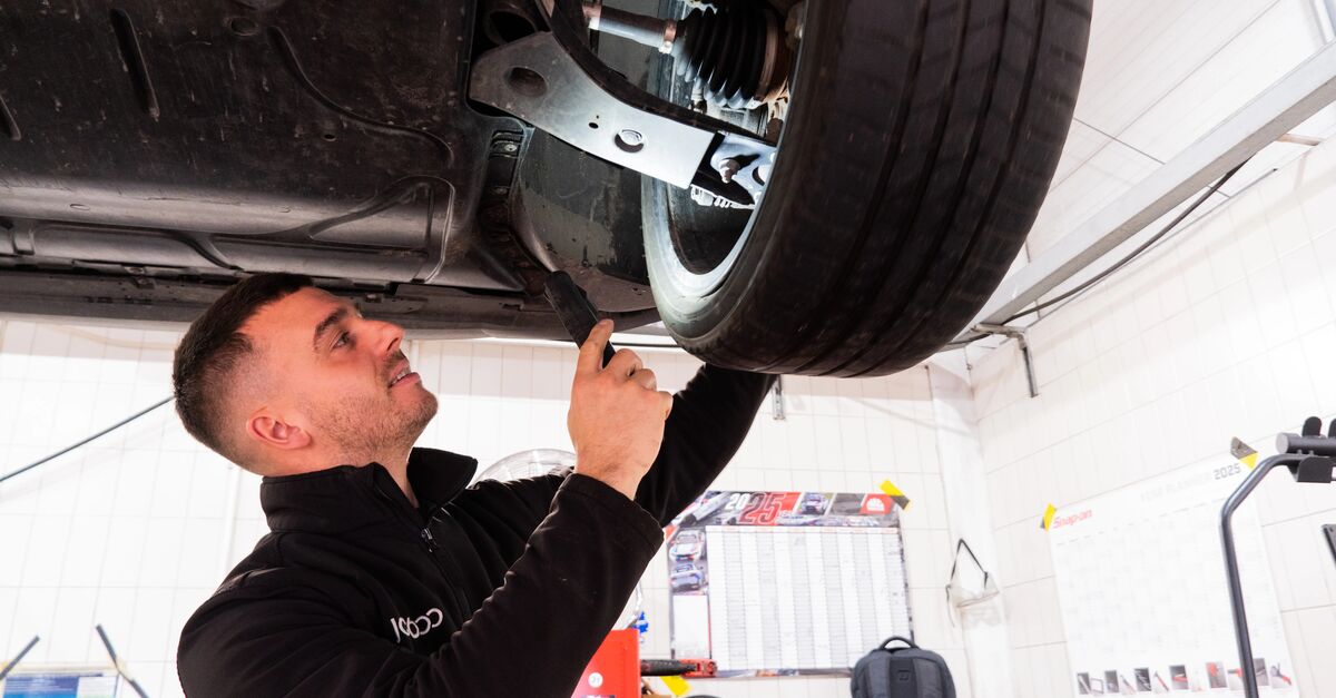 JCT600 Volkswagen Colleague checking the wheel of a vehicle