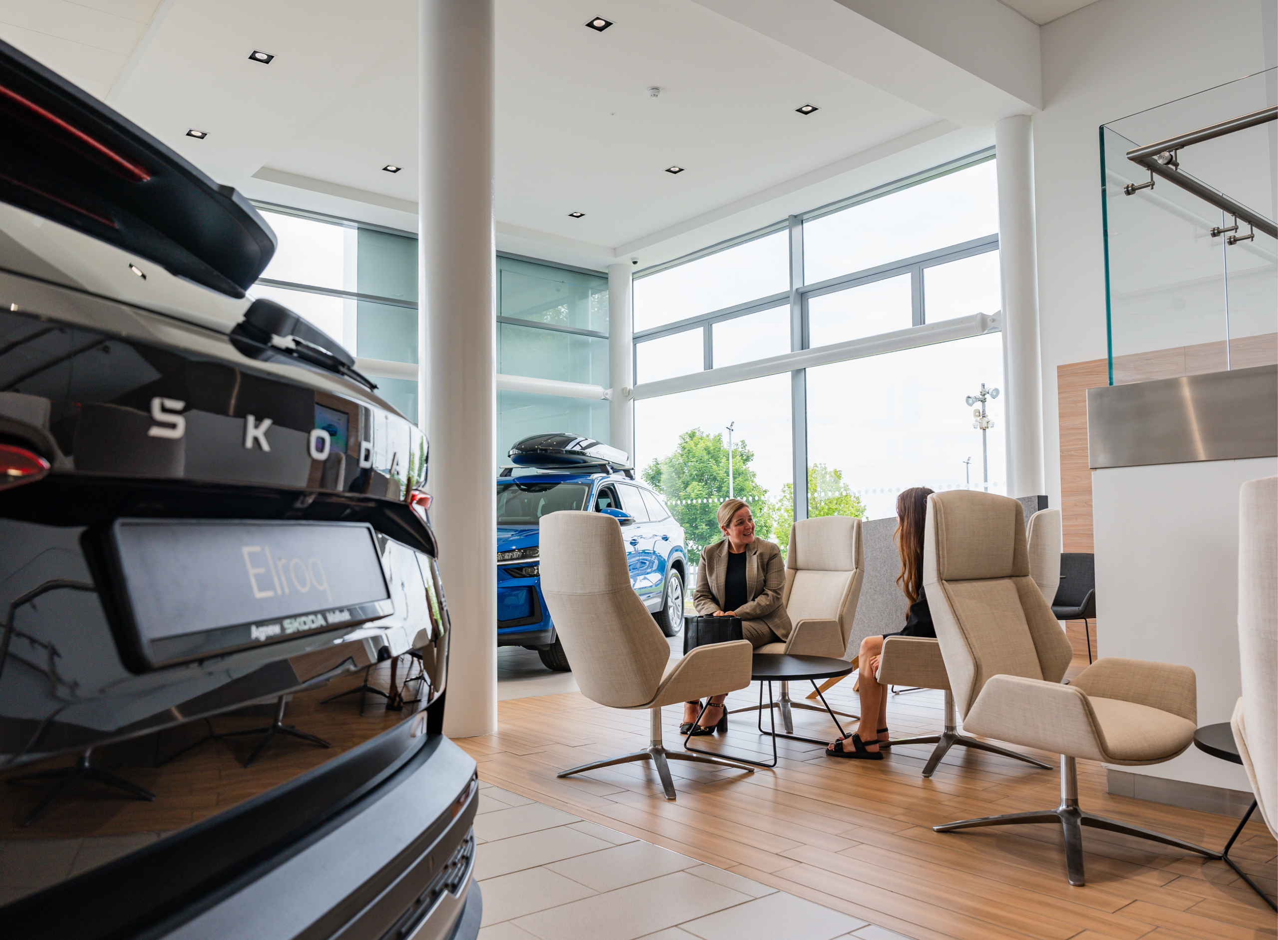 Customer and sales staff having a conversation at Agnew Skoda Belfast