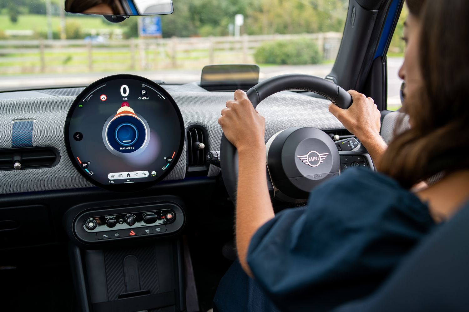The advanced circular OLED display design of the new MINI Cooper 5-Door.