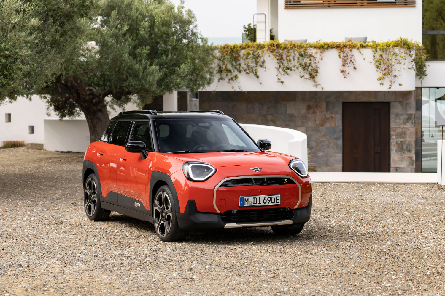 An orange All-Electric Mini Aceman.