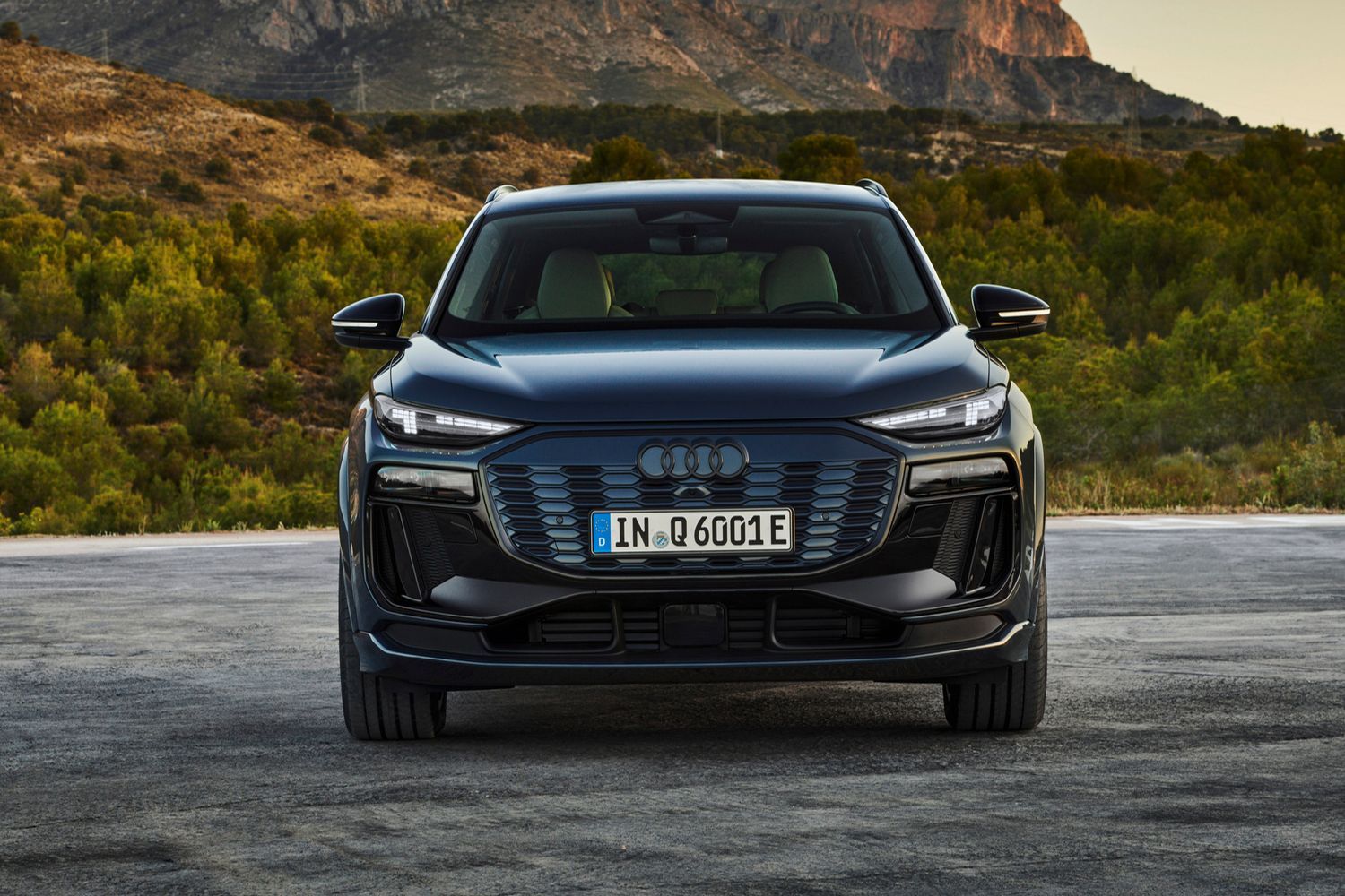 Front view of the new Audi Q6 E-Tron in Plasma blue metallic.