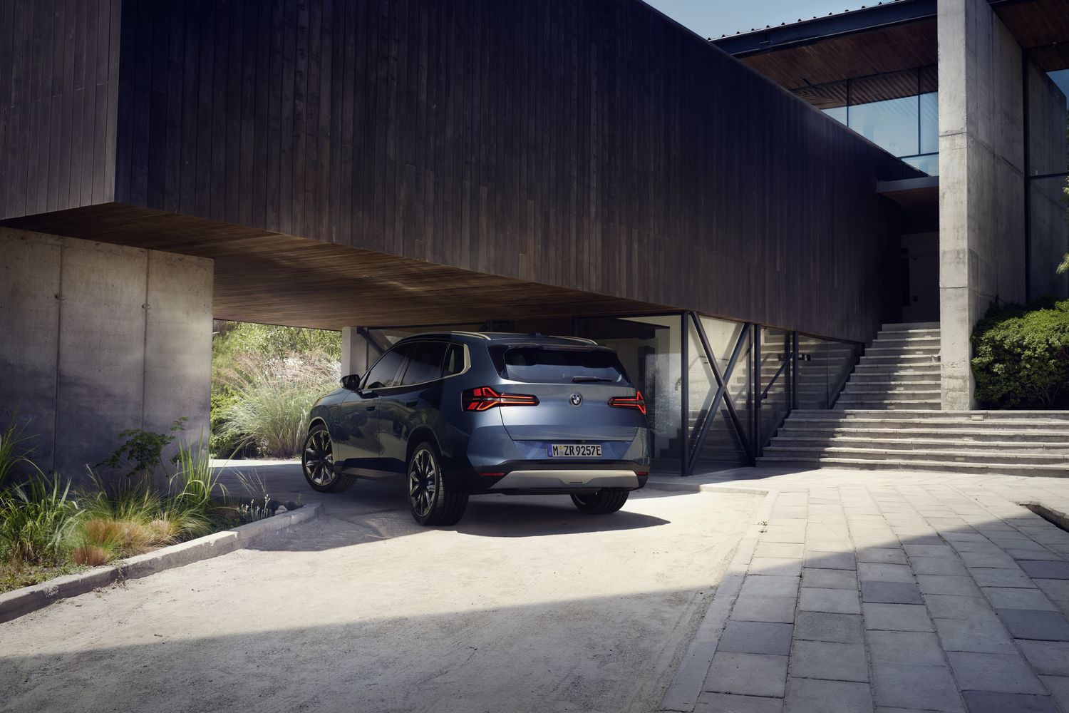 Exterior of the new BMW X3 parked at home.
