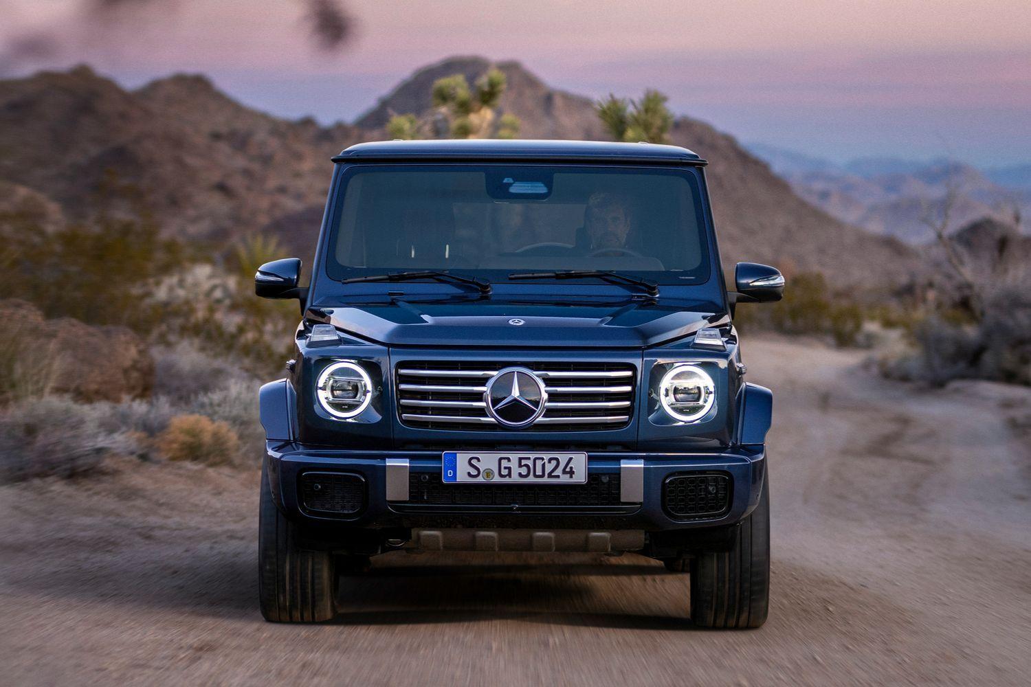 Front view of a dark blue Mercedes-Benz G-Class featuring an upgraded radiator grille design.